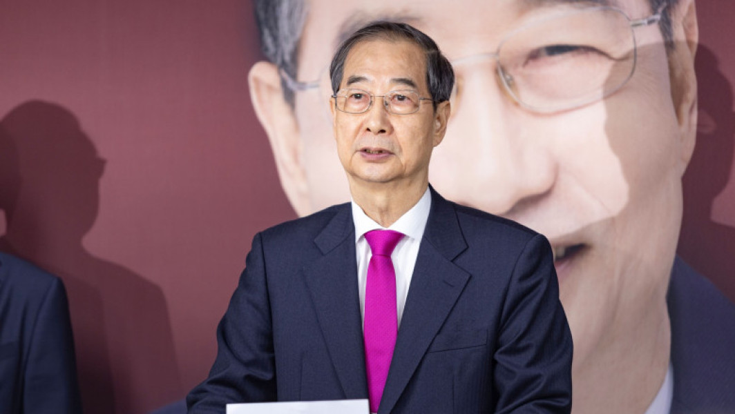 |> ### Fostul prim-ministru sud-coreean, Han Duck-soo, arestat preventiv în scandalul politic